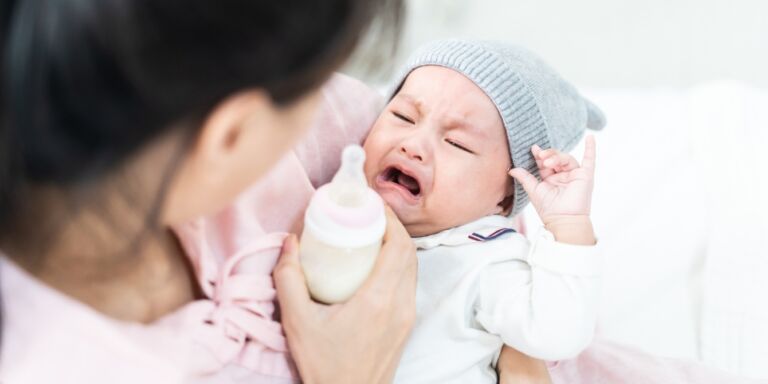baby crying about bottle Motherly