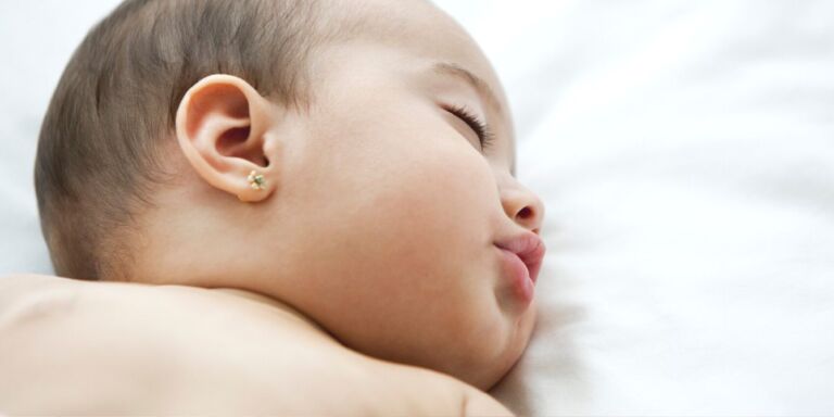 Infant with pierced ears