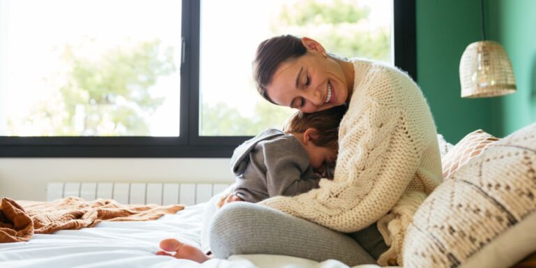 mom hugging child- first day of preschool