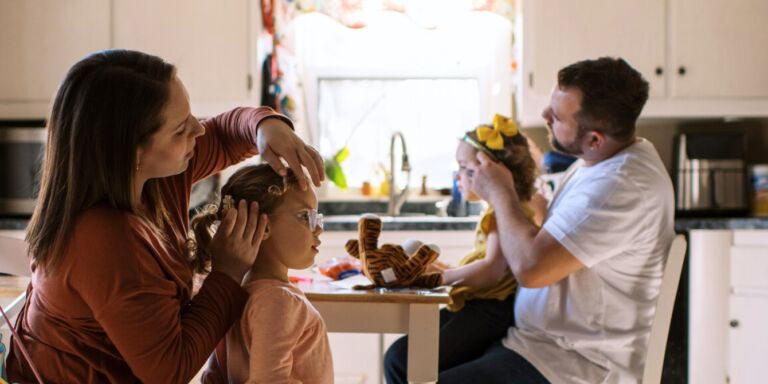 mom and dad doing kids hair- using ai to parent