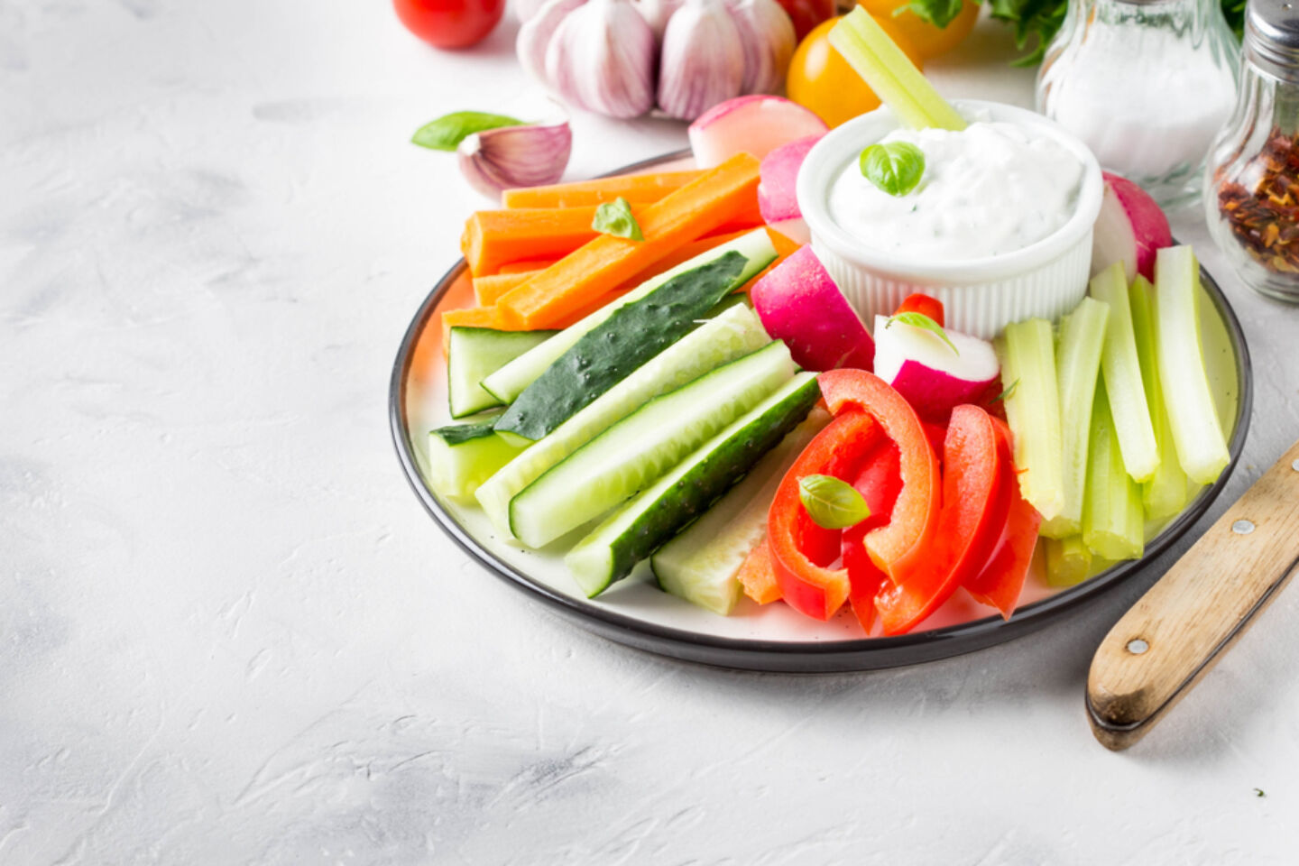 veggie sticks dip on plate Motherly