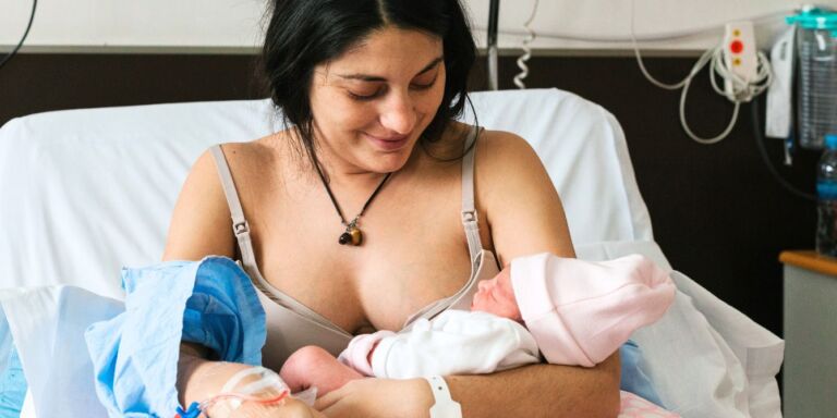 Mom holding baby after giving birth