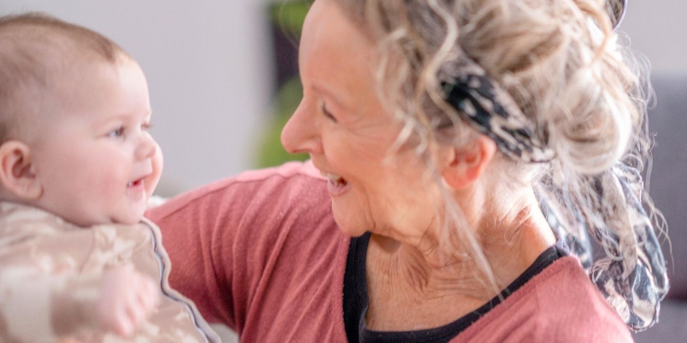 Grandma holding baby