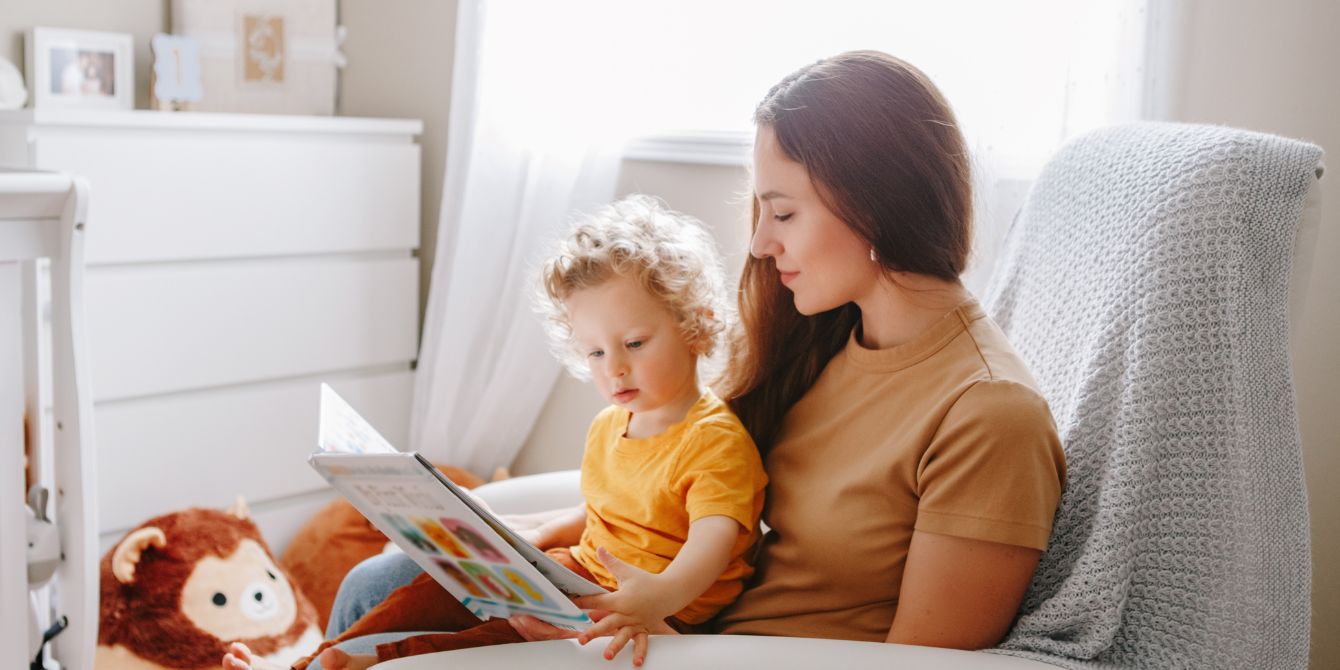 let them choose the long book - mom reading to child