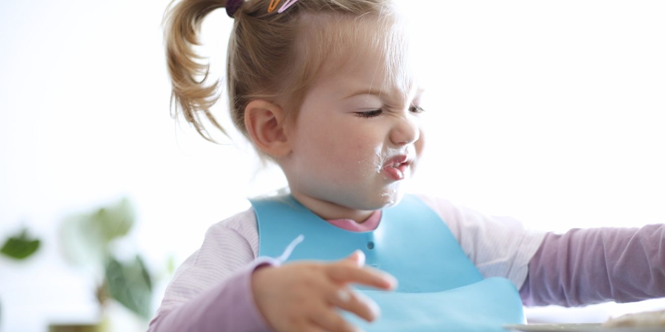 Toddler girl being a picky eater