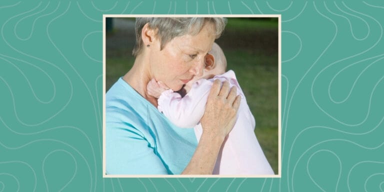 Reddit AITA: A picture of a grandmother holding her grandchild