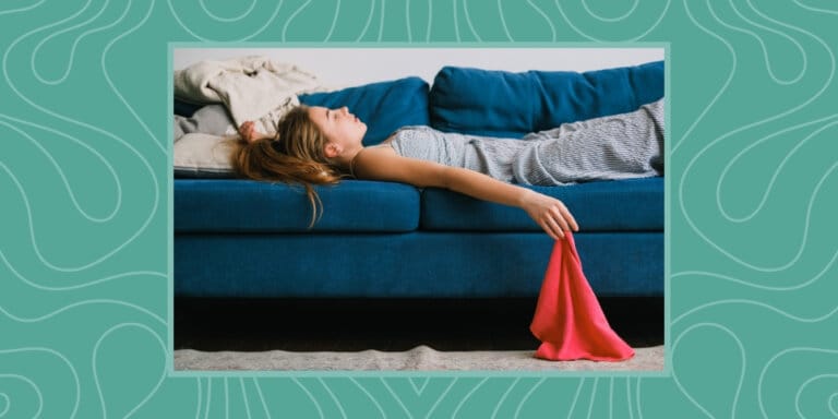 Mental load: An exhausted mom lying on a couch