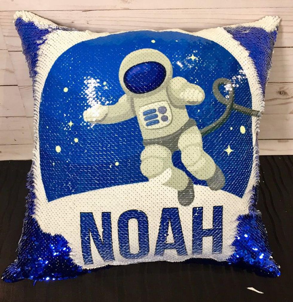 Sequin astronaut flip pillow